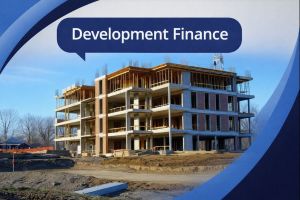 A blue and white branded graphic showing a multi-storey building under construction on a development site under a clear sky. At the top, a dark blue speech bubble reads “Development Finance”, with curved blue accents framing the corners.
